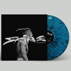 Skins (TRANSLUCENT BLUE + BLACK SPLATTER VINYL) | Mint (M) Mint (M)